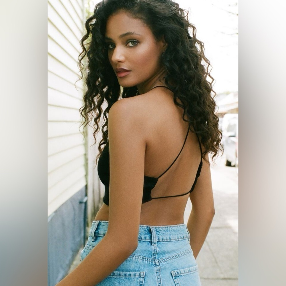 Garage Criss-Cross Bungee Strap Open-Back Cropped Cami in black. Size L